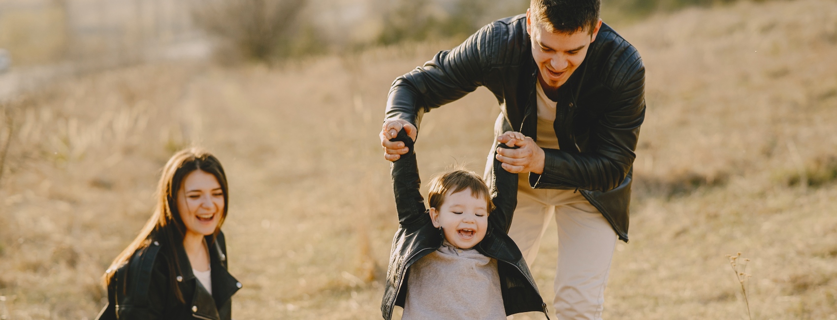 boy playing with parents