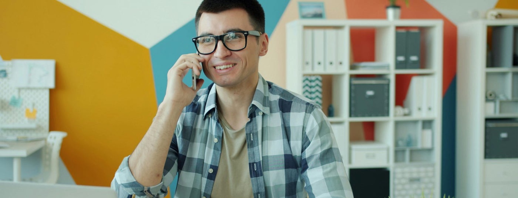 Man smiling on phone