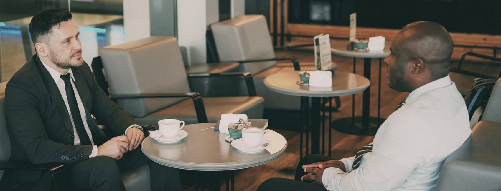 Two men having coffee